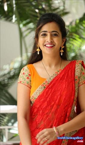 Anchor Lasya Latest Stills in Orange Saree