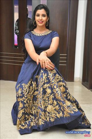 Anchor Syamala in Blue Dress Stills at Next Nuvve Movie Audio Launch
