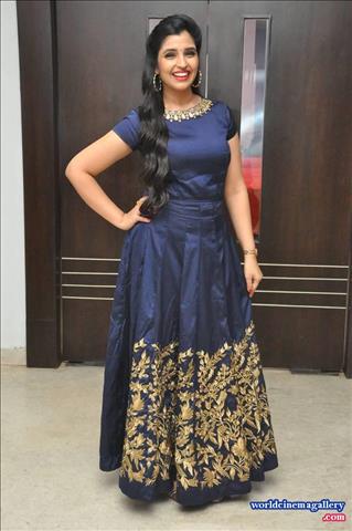 Anchor Syamala in Blue Dress Stills at Next Nuvve Movie Audio Launch