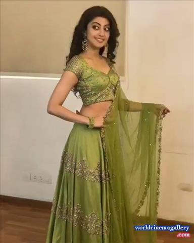 Pranitha latest stills in Green Half saree