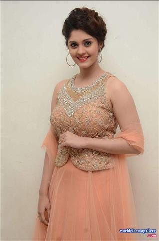 Surabhi Photos In Pink Dress At Audio Launch