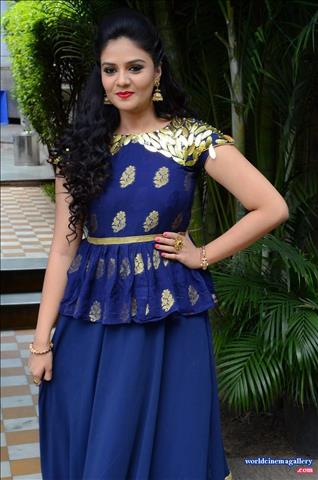 Sreemukhi latest stills in Blue Dress