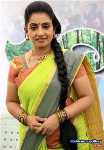 Telugu Tv Actress Sujitha stills in Yellow Saree 