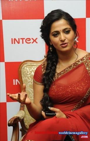 Anushka Stills in Red Transparent Saree at Intex Mobile Launch